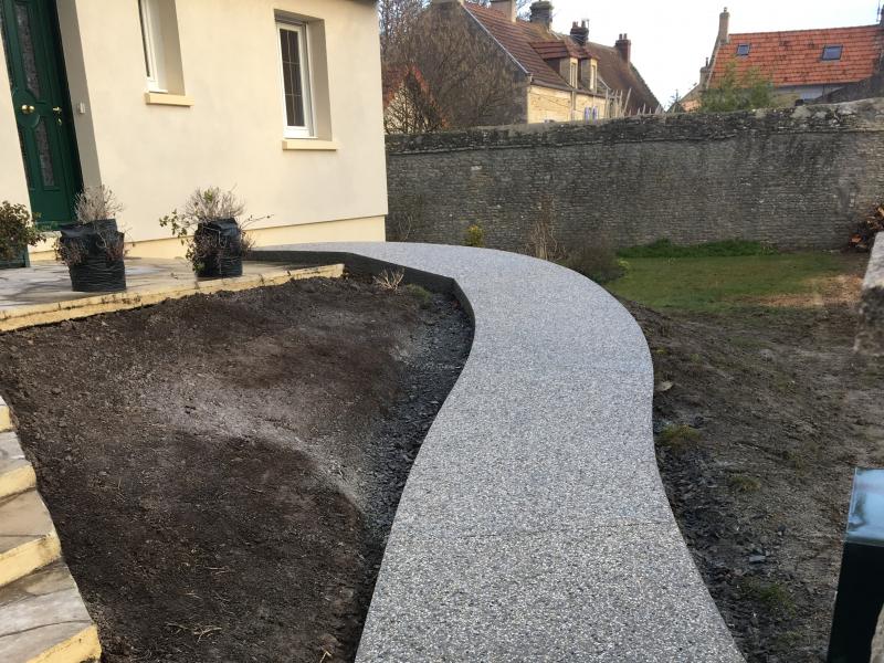 Image Réalisation d'une rampe PMR en béton désactivé en Normandie 