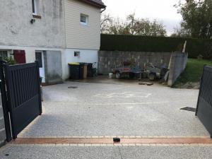 Descente de garage en béton désactivé dans le Calvados
